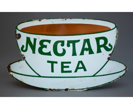 A vintage white and green enamel NECTOAR TEA advertising sign in the form of a teacup, approx 54cm wide overall 