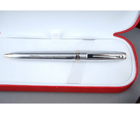 A Sheaffer fountain pen, 14k gold nib, boxed; a Sheaffer roller ball pen, boxed; a parker ball point pen, boxed; two empty Sh