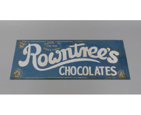 A Rowntrees Chocolates white and blue enamel sign, 'Makers To T.M. The King & Queen', 38cm x 91.5cm, (AF).
