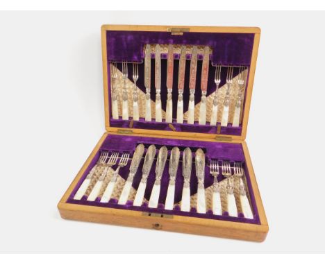 A Victorian plated half fish and fruit canteen, with mother of pearl handles, oak cased.