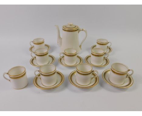 A Royal Albert porcelain demi tasse part coffee service, decorated in black and gilt with a Greek key band, comprising coffee
