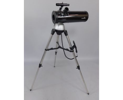 A Sky Watcher refractor telescope, D=114mm, F=500mm, with eye pieces, tripod and synscan remote control.
