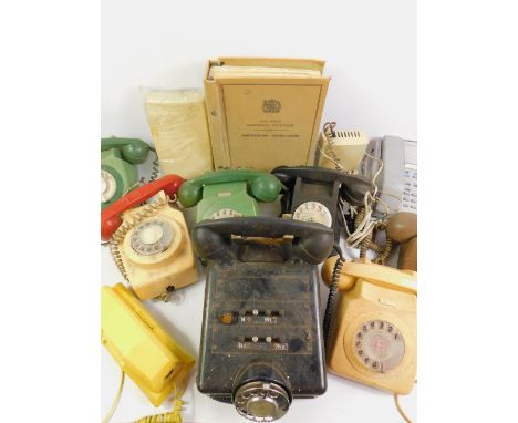 A collection of BT telephones, some two tone, military type phone and an Engineering instructions manual, 554440.