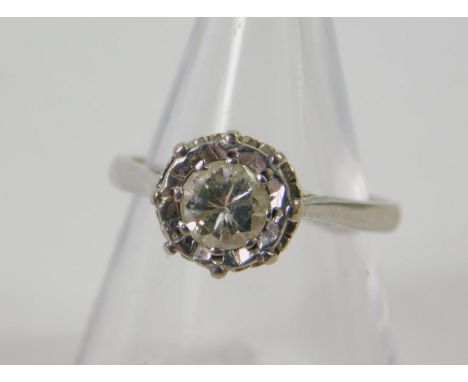 An 18ct white gold and diamond solitaire ring, illusion claw set, approx 1/3cts, size K, 2.9g. 