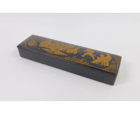 A Victorian Japanned lacquer pencil box, gilt decorated with Oriental figures playing a game, 20cm long.