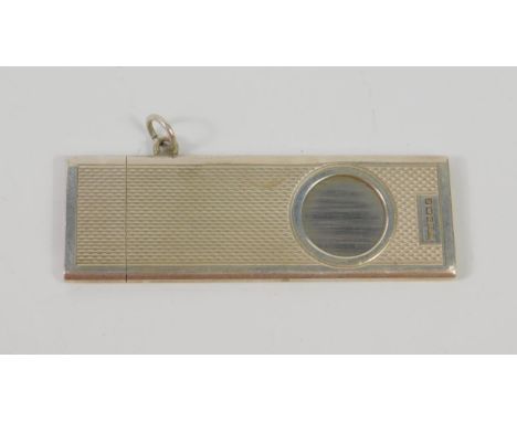 A silver cigar cutter, with engine turned decoration, Birmingham 1990, 0.84oz all in.