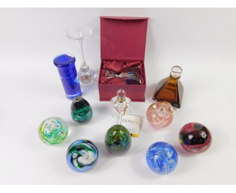 A Boda cut glass stem vase, Kosta Boda blue glass taper vase, three scent bottles and seven paperweights including Caithness 