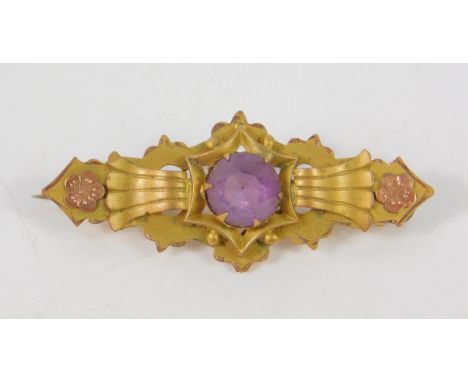 A Victorian amethyst set bar brooch, in burnished yellow metal, stamped 9ct, 2.5g.