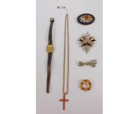 A cross on a cable link chain, rose metal stamped 9ct, 12.8g, Rotary lady's wristwatch and four costume brooches. 