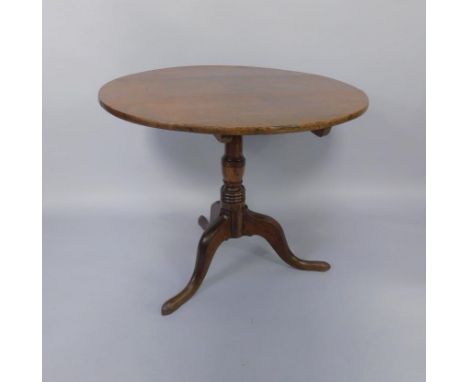 An 18thC oak circular tripod table, with turned column, raised on cabriole legs, 85cm diameter. 