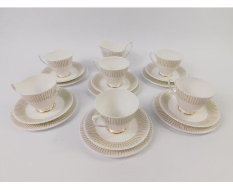 A Royal Albert porcelain part tea service decorated in the Capri pattern, comprising cream jug, six cups, saucers and plates,