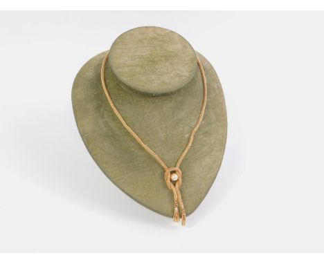 A cultured pearl set rope twist knot necklace, with drop tassels, yellow metal, one link stamped 750, bolt ring clasp stamped