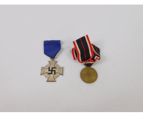 A WWII Third Reich Civil Service Faithful Service Medal, silver cross with black enamel, 'Fur treue dienste', blue ribbon, an