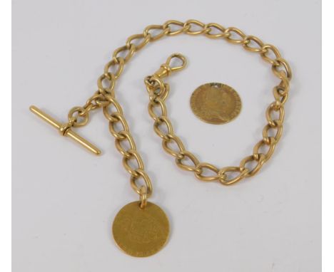 A George III spade guinea 1788, on an 18ct oval link Albert chain, with T-bar as fitted, together with a further holed spade 