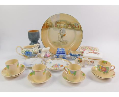 A Dresden porcelain leaf shaped dish painted with flowers, three Royal Doulton coffee cans and six saucers, decorated in the 
