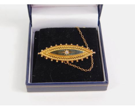 A Victorian Etruscan revival diamond set brooch, in yellow metal with safety chain, as fitted, 6.2g.