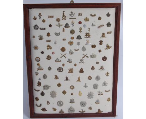 A large collection of assorted Regimental badges and insignia to include Lancashire Fusiliers, Royal Artillery, Royal Berkshi