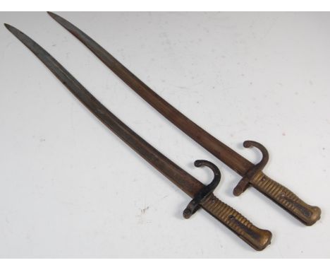 A 19th century chassepot bayonet, the 57cm yataghan style blade stamped to the ricasso with the Knights helmet logo of W.R. K