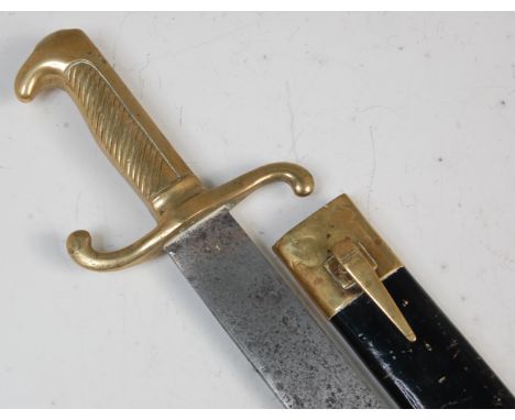 A 19th century German M1864 faschinenmesser, having a  44cm slightly curved single edged blade with hooked brass quillon and 