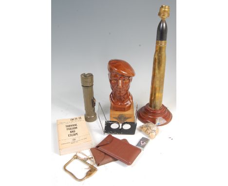 A glazed ceramic bust of a paratrooper, together with two US Army CF - 8 Stereoscopes, a brass D-ring clip, brass buttons and