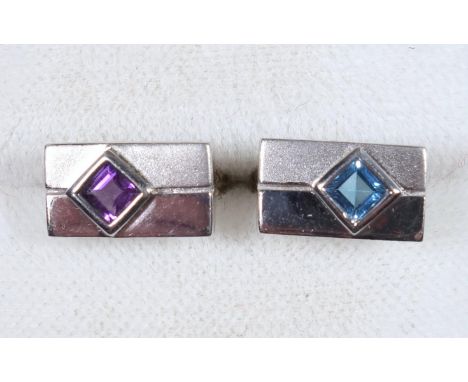 PAIR OF WHITE METAL RECTANGULAR EAR STUDS, ONE SET WITH A LOZENGE CUT TOPAZ THE OTHER WITH AN AMETHYST STONE, STAMPED 9 K, GR