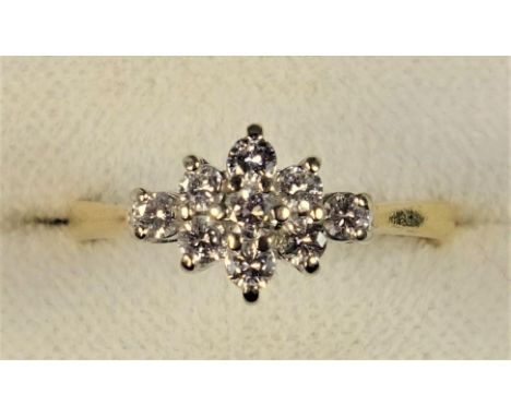 18ct GOLD RING SET NINE DIAMONDS, 31 PTS. APPROX, SIZE M, 2.5 GRAMS. 