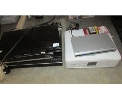 A Canon printer with spare inks, and Alba freeview, a Panasonic Viera cast Bluray player, a digital receiver and a video/dvd/