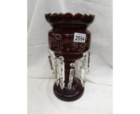 A hand decorated ruby glass lustre.