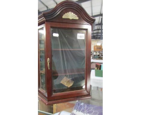 A small mahogany effect wall hanging shelf display unit 40 x 14 x h 47.5 cm