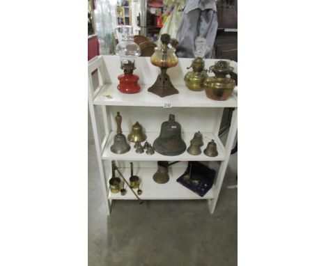 A mixed lot of brass ware etc., including oil lamp fonts, bells, measures etc., (Collect only)