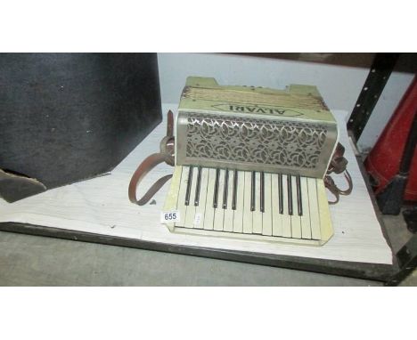 A German Alvari accordion in tatty box. (Collect only).