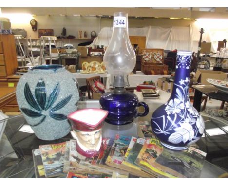 19th century Florentine cameo blue glass vase and a blue glass finger lamp, a Doulton character jug and green stone ware vase