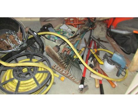 A huge lot of garden tools, a ready to fit BMWX5 sport tow bar and a bucket of chain. (collect only)