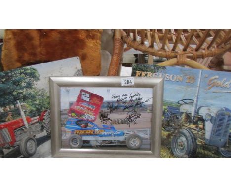 Two retro metal Massey Ferguson tractor signs, and a stock car a/f racing photograph, signed.