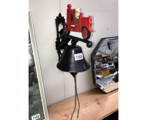 An exterior cast iron fire engine bell