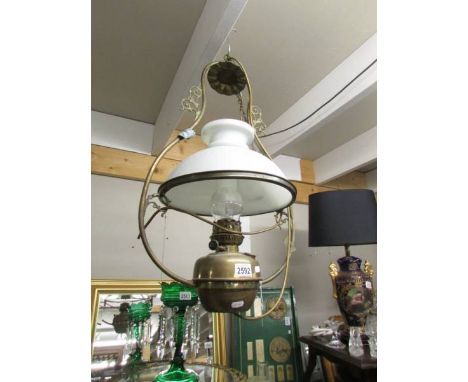 A hanging oil lamp with shade converted to electric.  (Collect only)