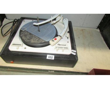 A Garrard record player. (Collect only). ****Condition report**** Lights up, turntable spins at various speeds, records drop,
