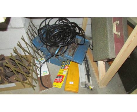 A cantilever tool box with tools, various wiper blades etc.,