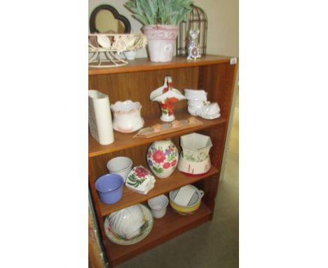 A three shelf bookcase. (Collect only).