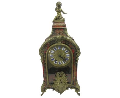 An excellent Beulle mantel clock in good working order, 60 cm tall. (Collect only) ****Condition report**** Slight lifting in