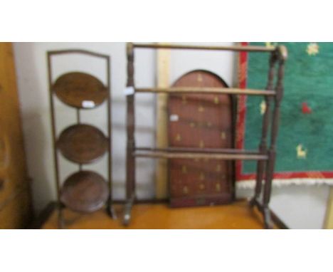 A three tier cake stand, a towel rail and a bagatelle board. (Collect only)