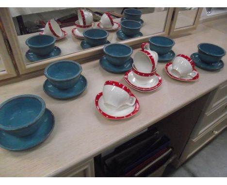 An 8 piece vintage set of polka dot cups and saucers and 5 Poole soup bowls with adjacent saucers