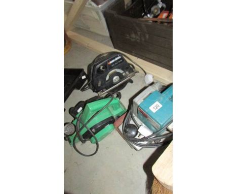A router, a sander and a saw.  (Collect only)