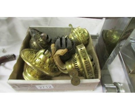 Five oil lamp burners, three with galleries.