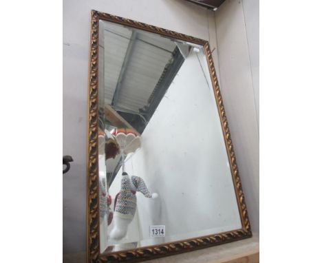 A vintage gil framed bevel edge mirror 45 x 70 cm