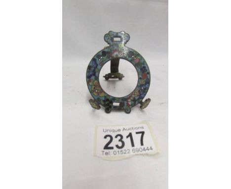 An enamel pocket watch stand.