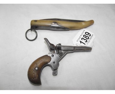 A vintage small starting pistol a/f and a bone handled Jaffre pocket knife