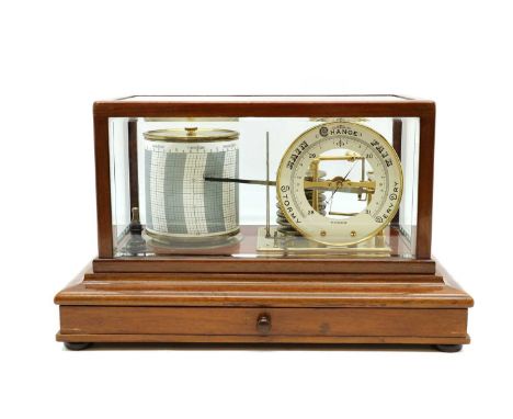 A mahogany cased barograph,early 20th century, with bevelled glass sides, complete with thermometer, ink and drawer, containi