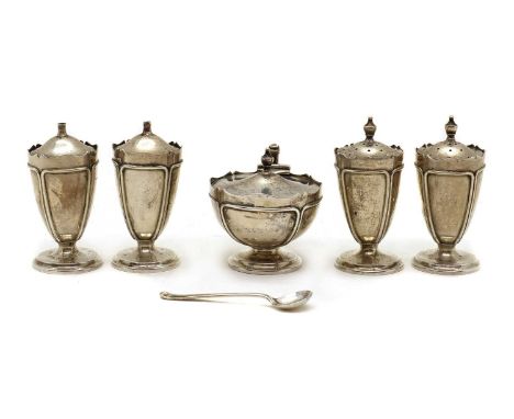 A silver cruet set,by E S Barnsley &amp; Co, Birmingham 1913, comprising a mustard pot with an associated spoon, 6.5cm high, 