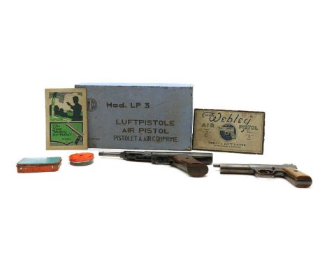 A Webley Mark I 0.22 air pistol,with a walnut grip, impressed mark and numbered '4543', complete with part of the box and pap